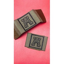 Distintivos con el arma para arnes